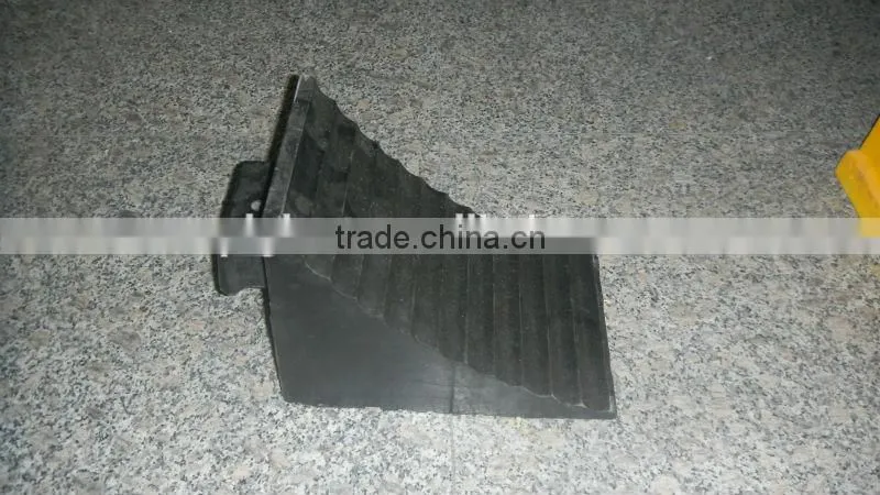 Rubber wheel chock in parking equipment