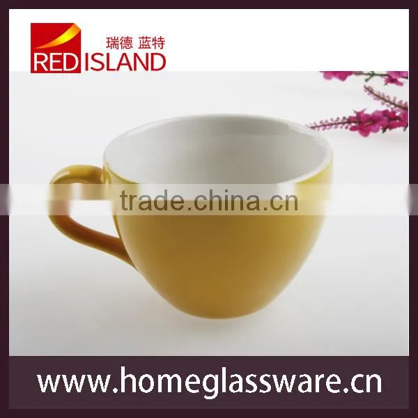 small colored ceramic coffee mug