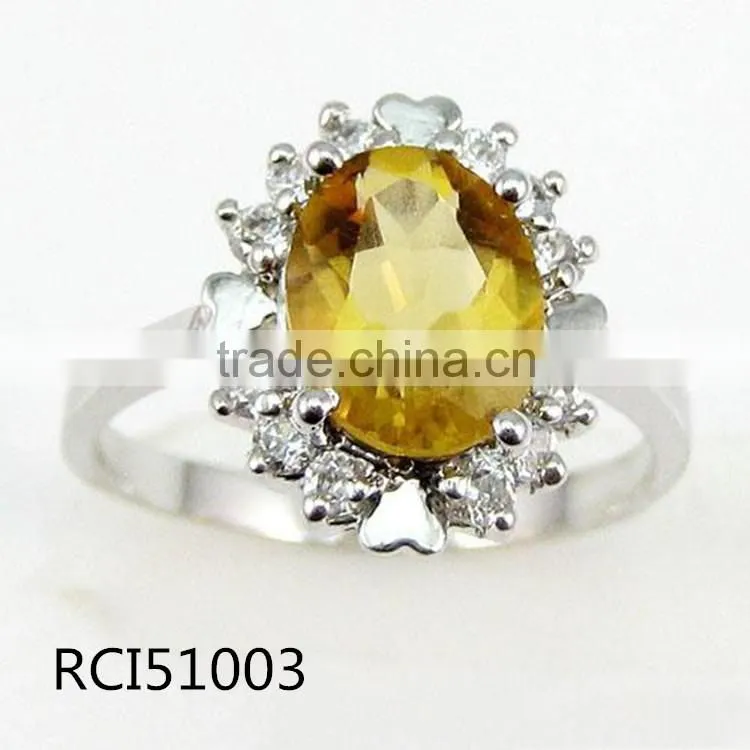 Ring sterling silver and citrine 7x9mm faceted oval with twelve-rhinestone