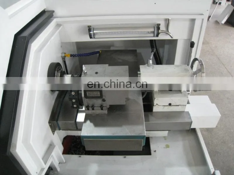 The small cnc lathe machine with chuck and tool turret CK0640A