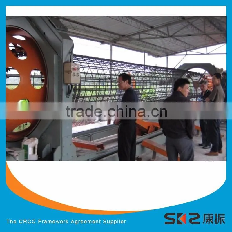 Cage assembler for the production of round cages with welded spirals and pre-set pitch
