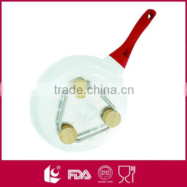 Stainless steel expandable metal pot holder with rubber feet