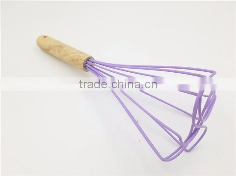 Wooden egg whisk