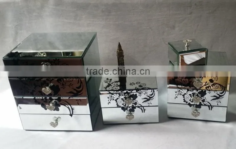mirrored jewelry box with four drawers