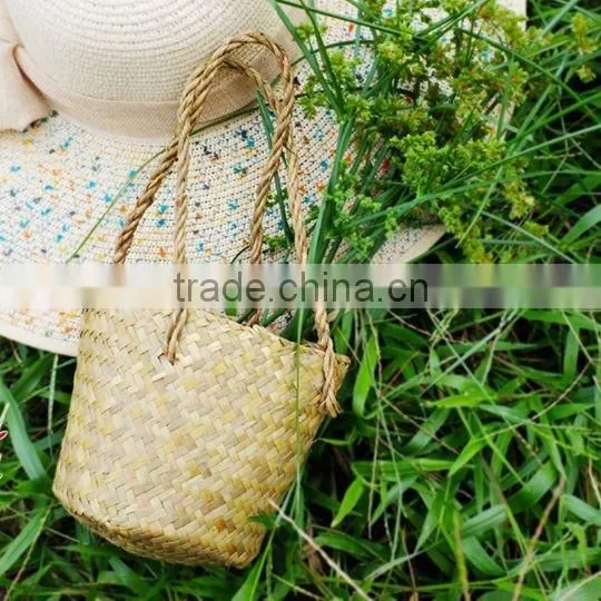 Seagrass beach bag with seashell decoration, cool design for summer holiday