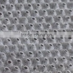 Double location for the cutting and rewinding non-woven punching machine