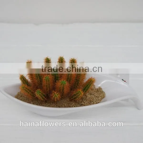 Natural looking potted artificial grass/succulent plants