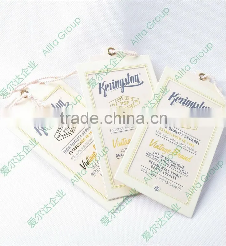 China professional customize a series of gold foil hang tag with gold foil printed plastic seal tag