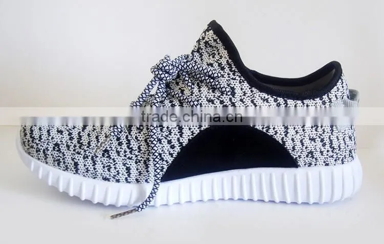 Good selling black and white color basketball shoes men with EVA outsole