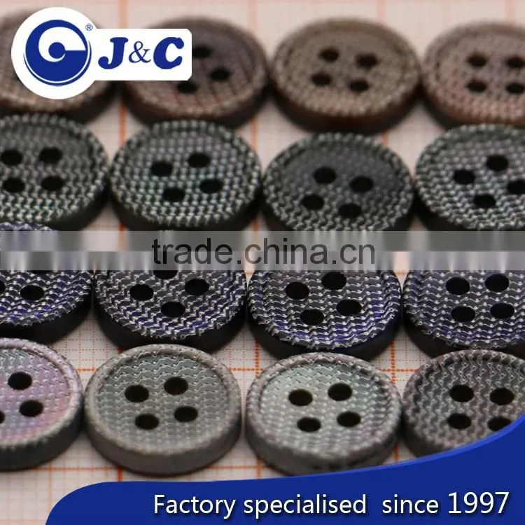 black natural shell buttons with engraved mark