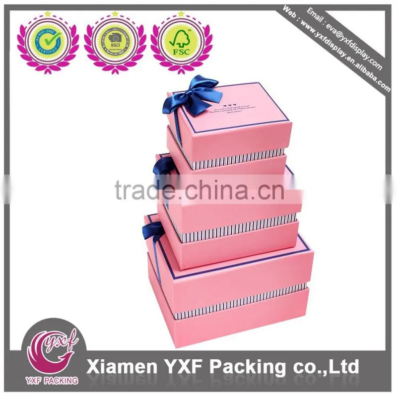 Paperboard gift box with silk ribbon decoration