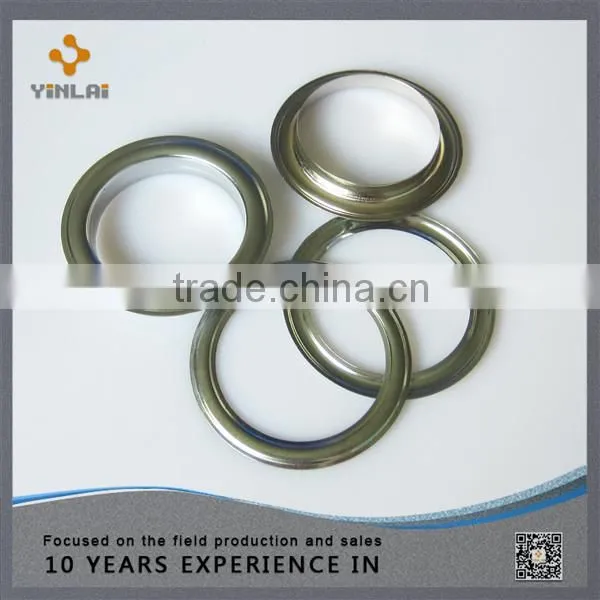 Golden metal eyelet with washer
