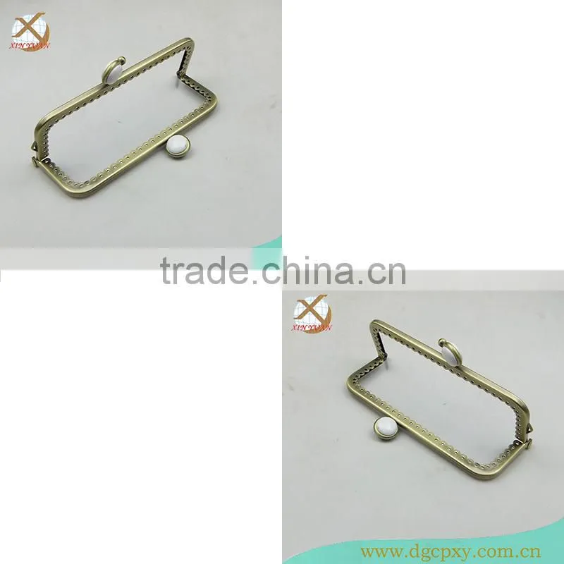 small metal purse frame with whirte gems