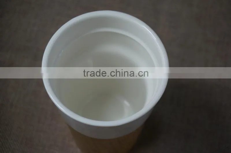 Ceramics coffee cup with bamboo sleeve