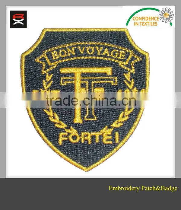 Adhesive pellon backing embroidered border woven patch