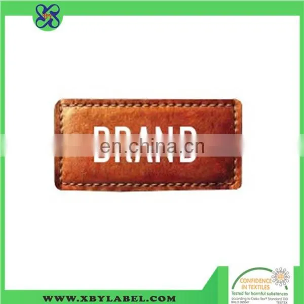 Latest style genuine leather label with metal logo for clothing
