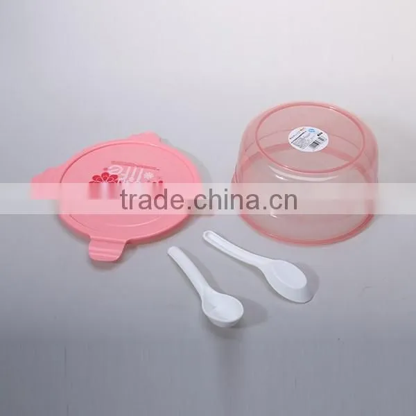 Household pink round four locked lunch box with spoon