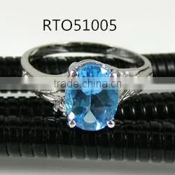 FREE SHIPING Ring sterling silver and blue topaz (natural), 7x9mm faceted oval with ten-rhinestone