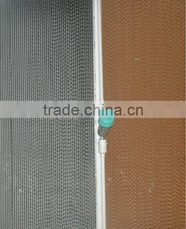 evaporative cooling pad cooling system for poultry farm