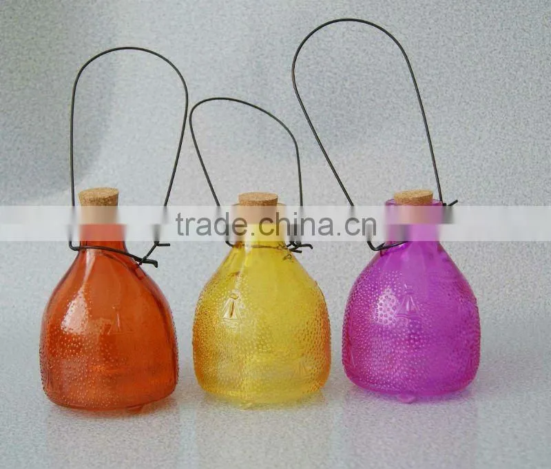 middle size colored glass wasp bottle