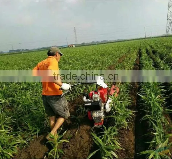 Tractor mounted lawn mower auger soil drilling tiller