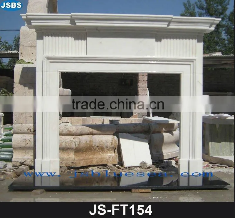 Stone carving of white fireplace mantel