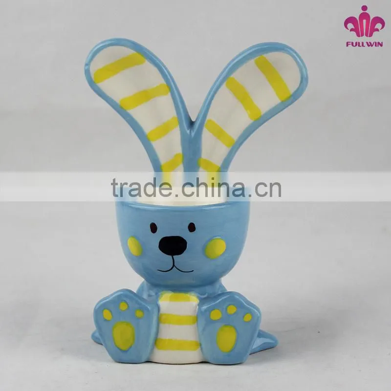 Ceramic egg holder with rabbit design
