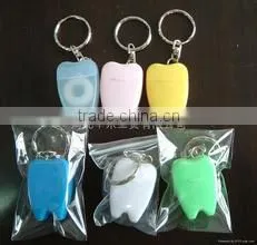 Nylon bristle tooth brush with dental floss and dental floss pick