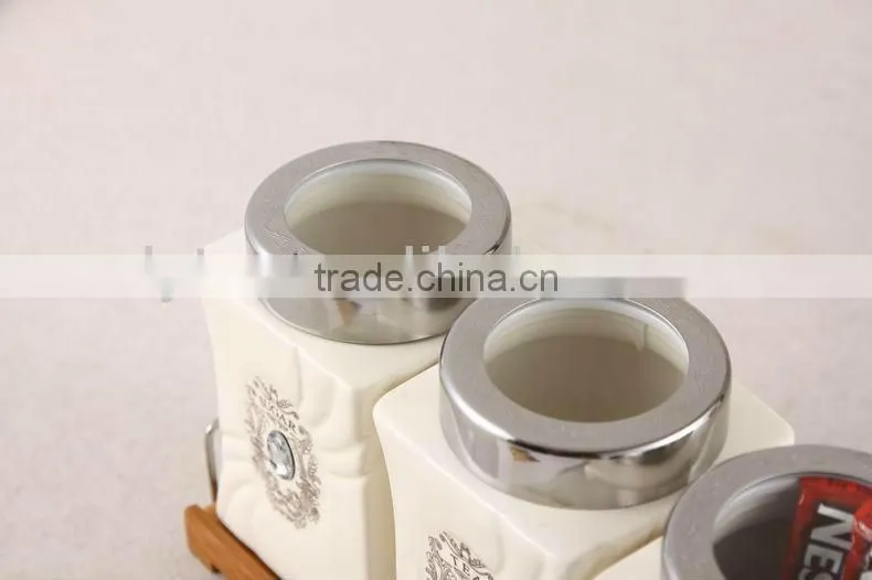 ceramic canister set with stainless lid & wooden stand