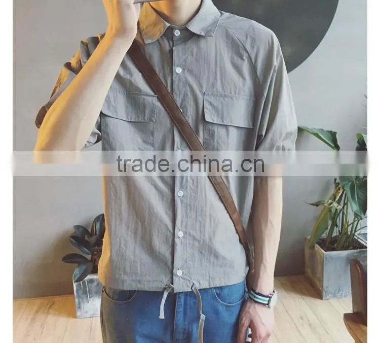 Loosely contracted pocket short sleeve shirt