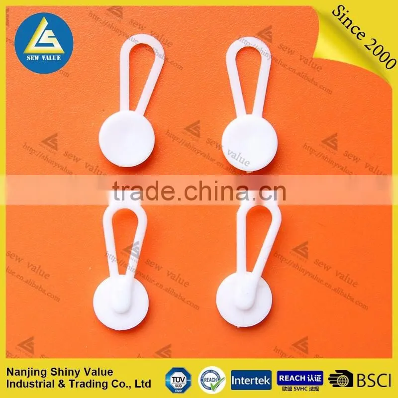 Plastic material shirt button extenders for easy fitting of your dress
