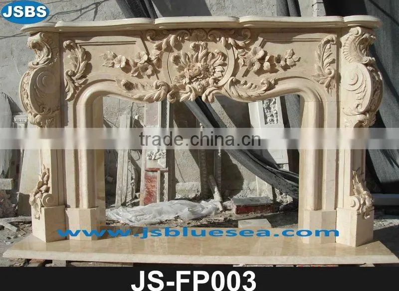 Carved white marble fireplace frame