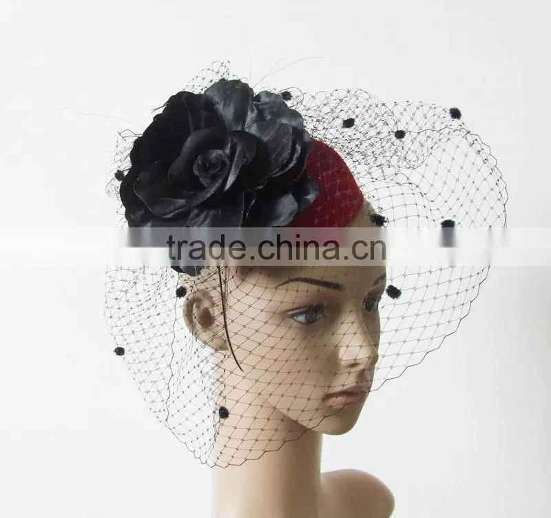 Felt fascinator hat trimming with fabric flower and netting