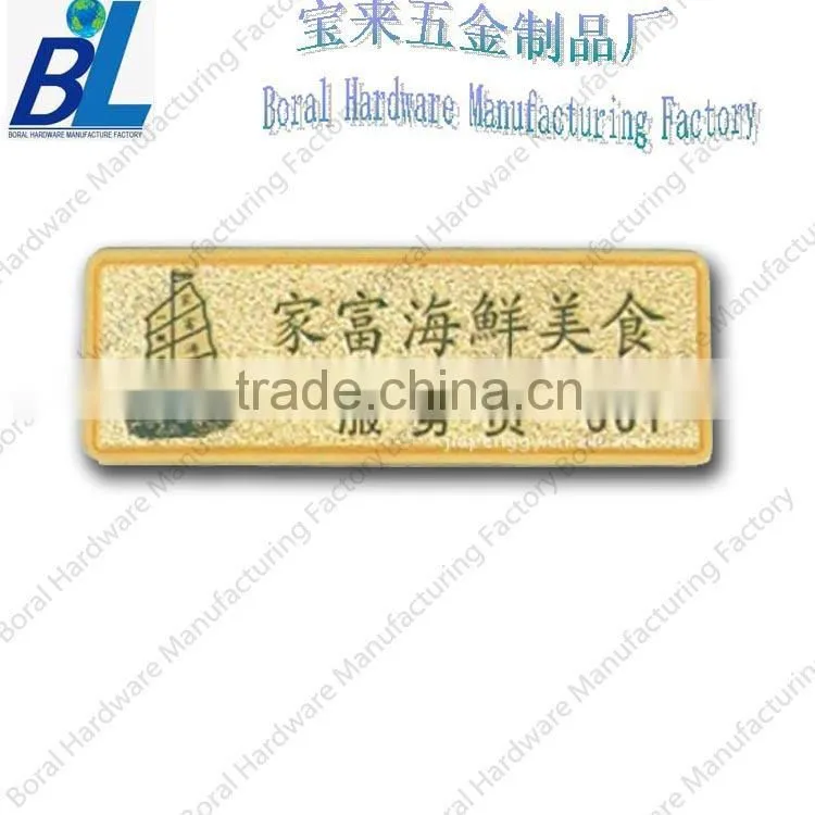 Printed screw hold metal plate for brand logo
