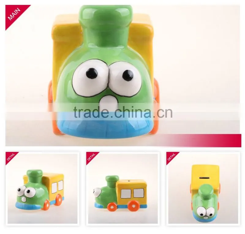 Hot selling train shape piggy bank ceramic coin bank with handle