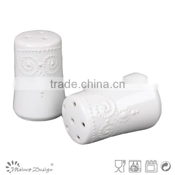 ceramic salt and pepper jars embossed round white
