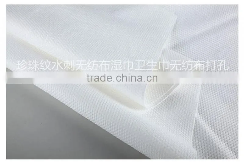 Double location for the cutting and rewinding non-woven punching machine