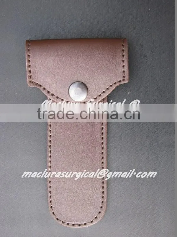 VINTAGE RAZOR WITH LEATHER COVER