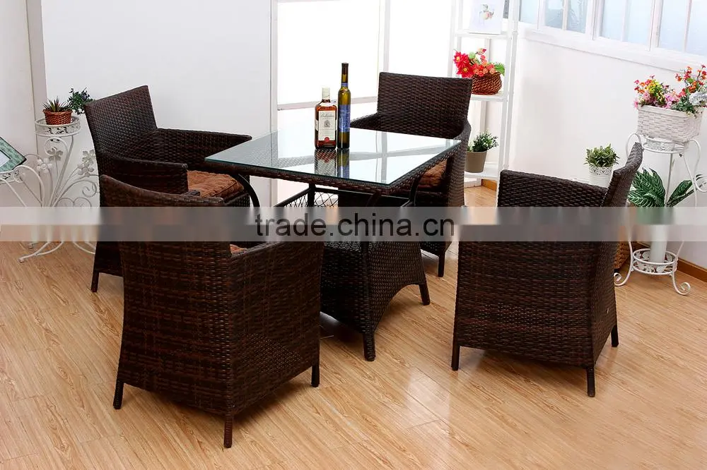 pe rattan tempered glass square table set with four rattan armchairs living room furniture