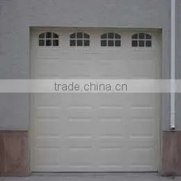 Automatic sectional garage door