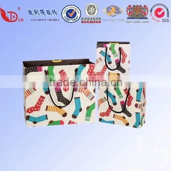 special design cost production paper packing bag low price