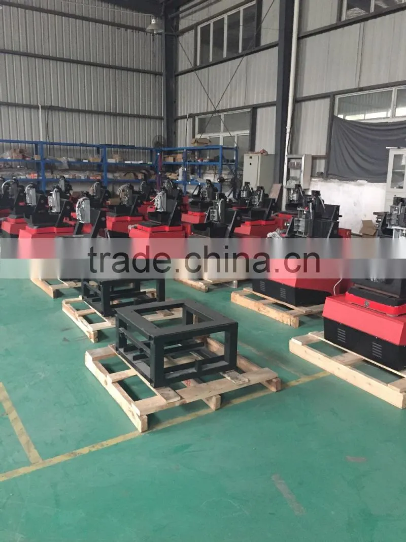 Paper roll die cutting machine with waste removal feature