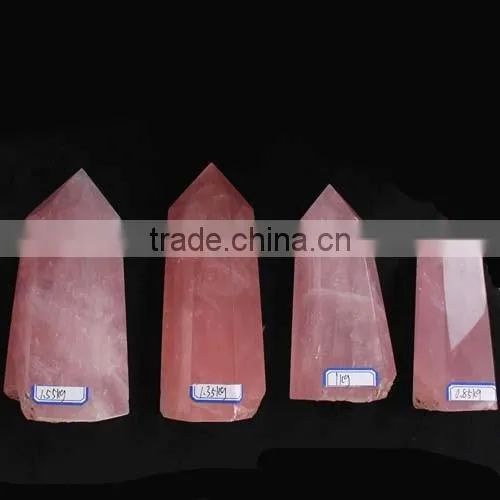 bulk of natural rock polished rose quartz stone crystal tower