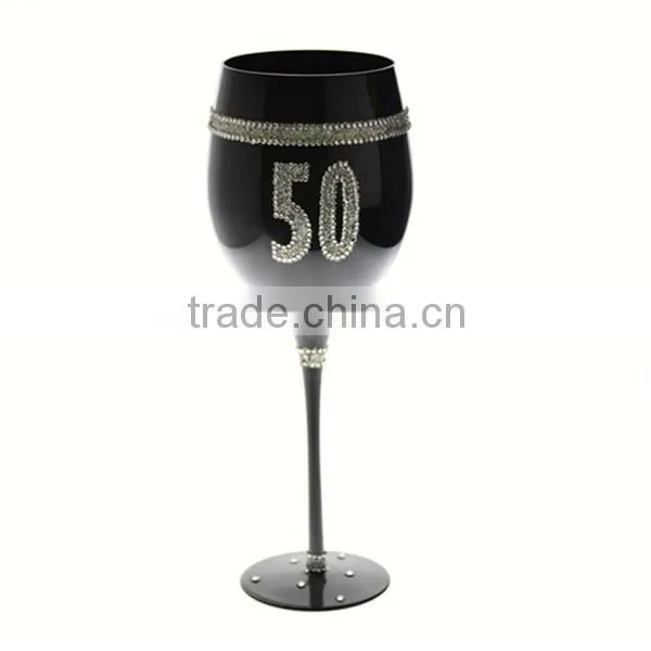 mouth blown black wine glass with decoration
