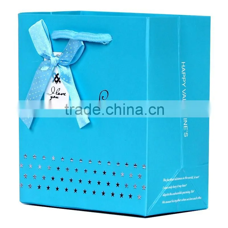 Reusable luxury clothing packaging paper bag with bow