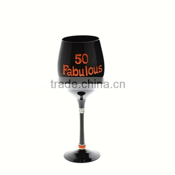 mouth blown black wine glass with decoration