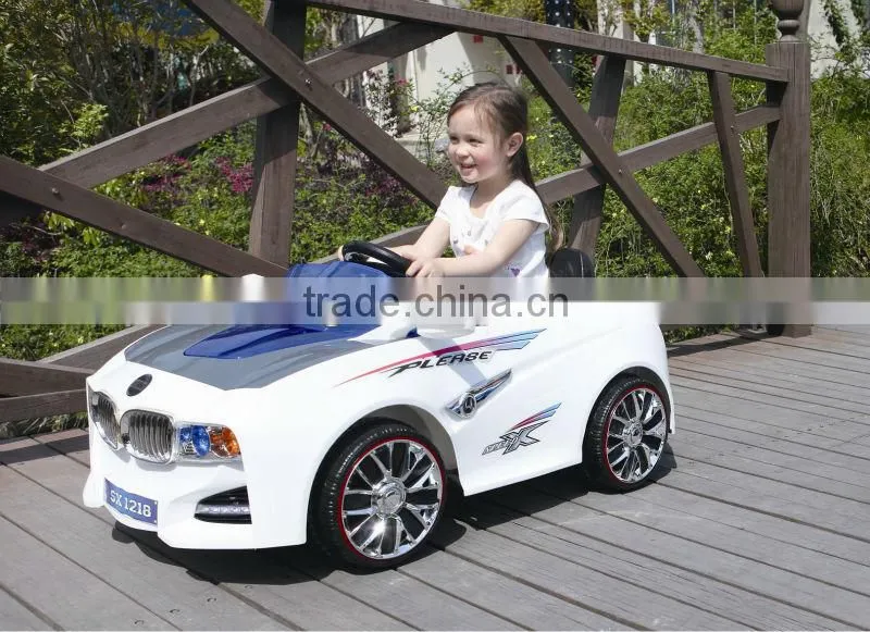 Four Wheels Battery Toy Car with MP3 Remote Control
