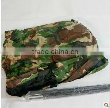 Children play camouflage tent house