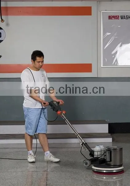 Hand held floor polishing machine