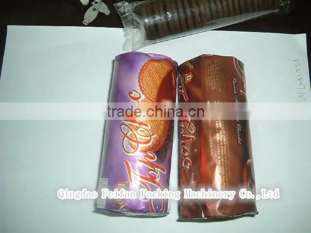 High speed envelope type biscuit packing/wrapping machine